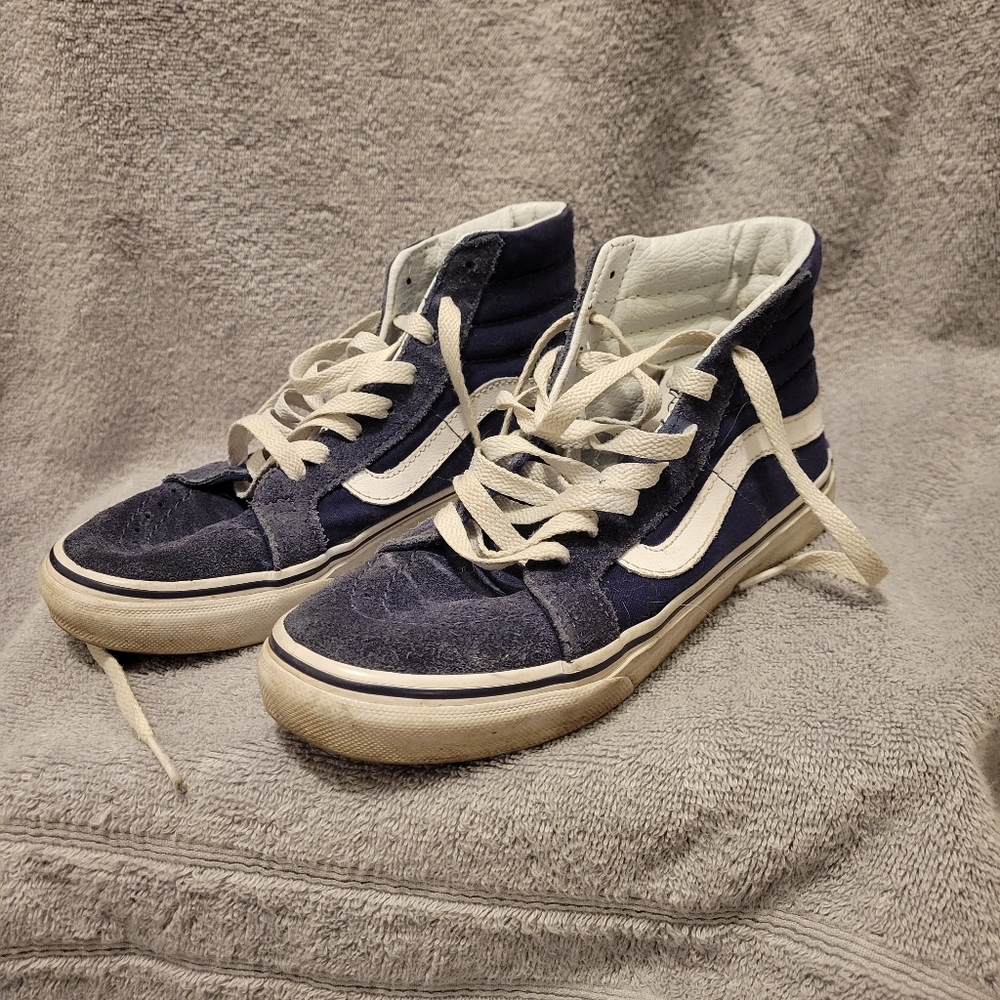 Two pairs of Vans high tops
